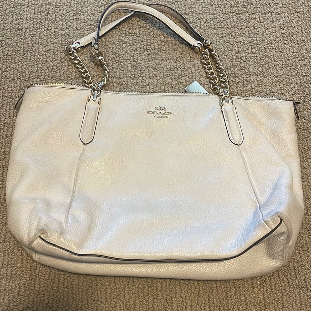 Cream and gold coach purse